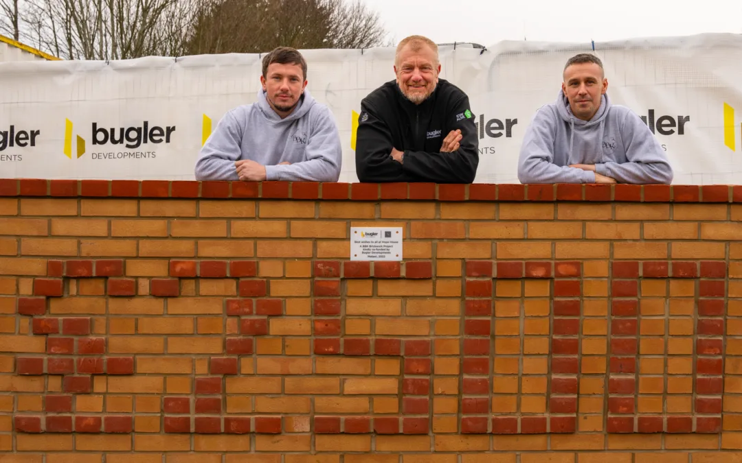 BBK Brickwork receive donation for Malawi charity build